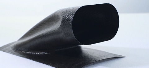 A hollow composite duct made with FDM sacrificial composite tooling.
