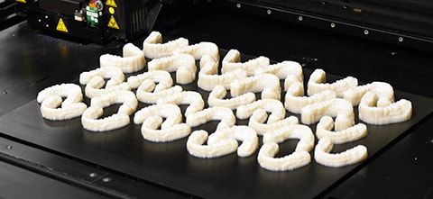a printer with 3d printed dental molds