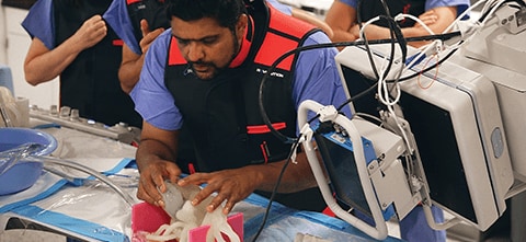 a man working on a 3D printed medical model